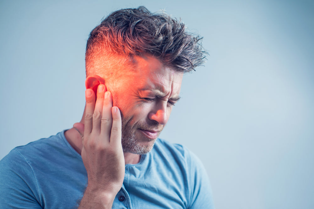 An image of a man with ear infection