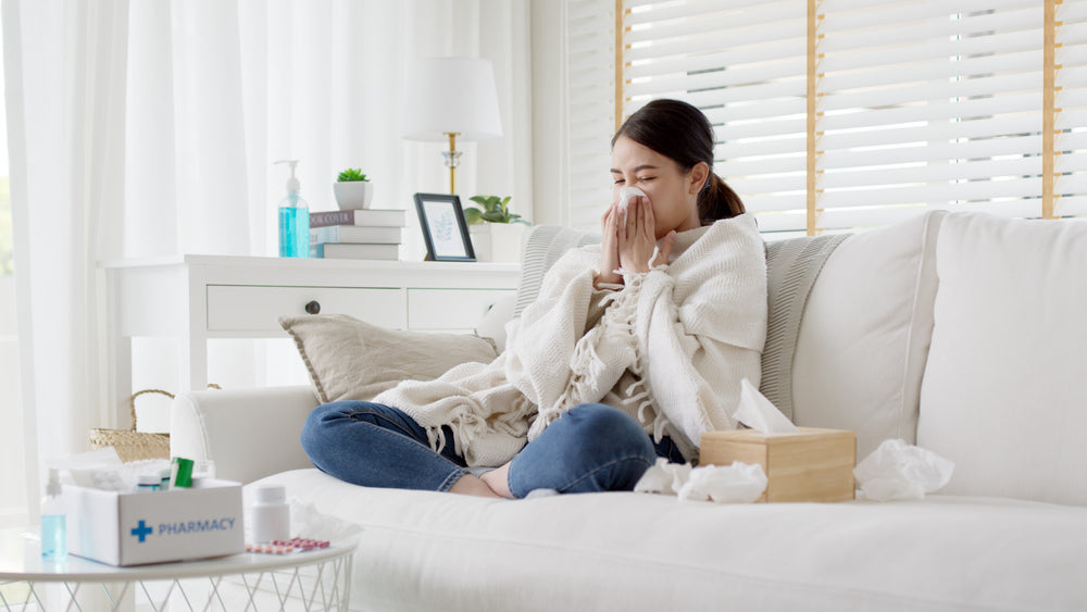 An image of a woman having cold or flu