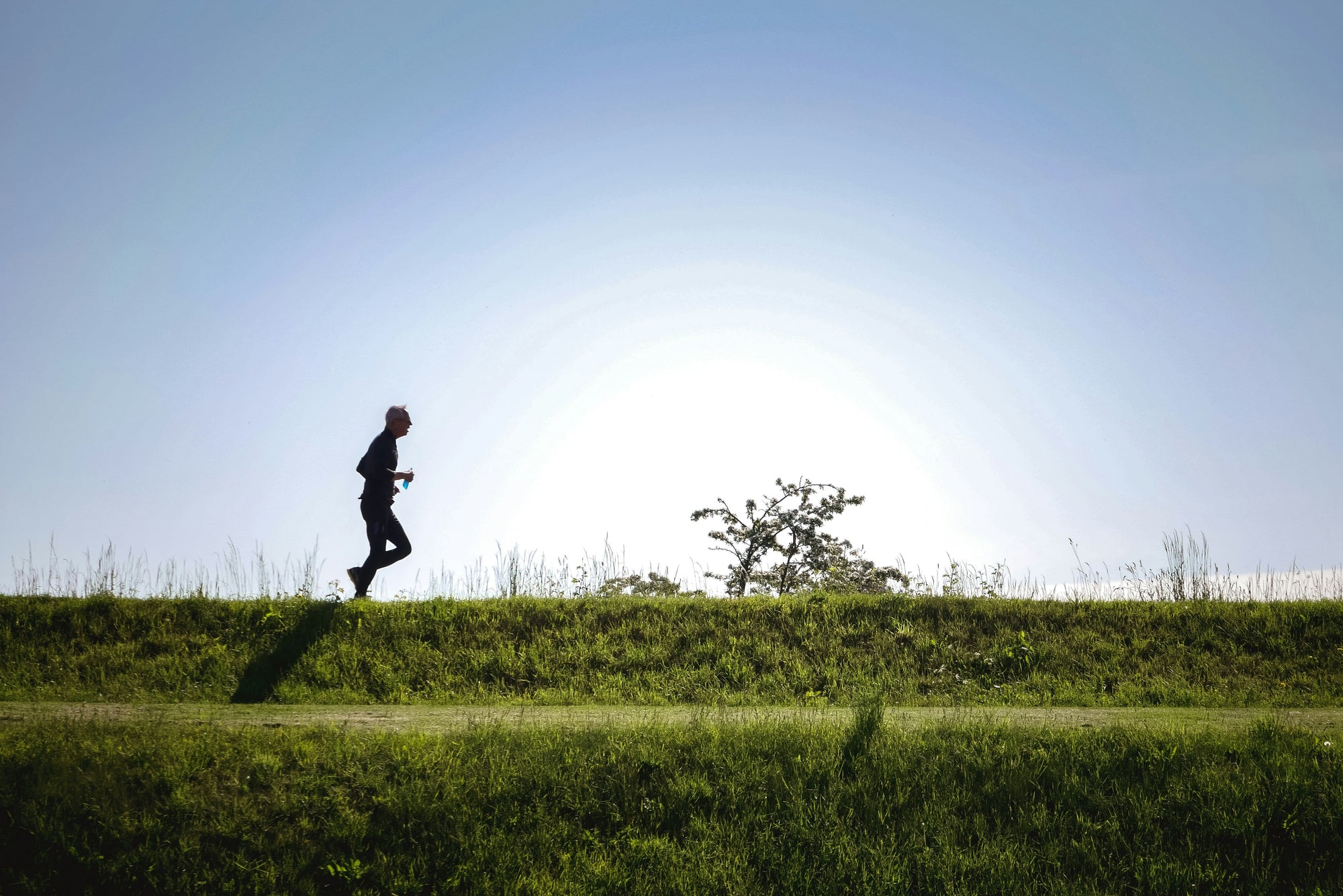 Man running to reduce anxiety & stress 