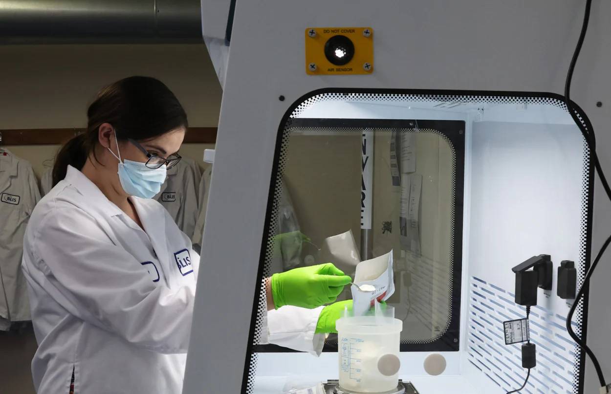 An image of a researcher experimenting with probiotics in a lab